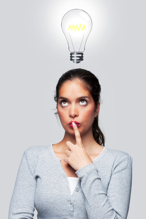 woman thinking with light bulb overhead